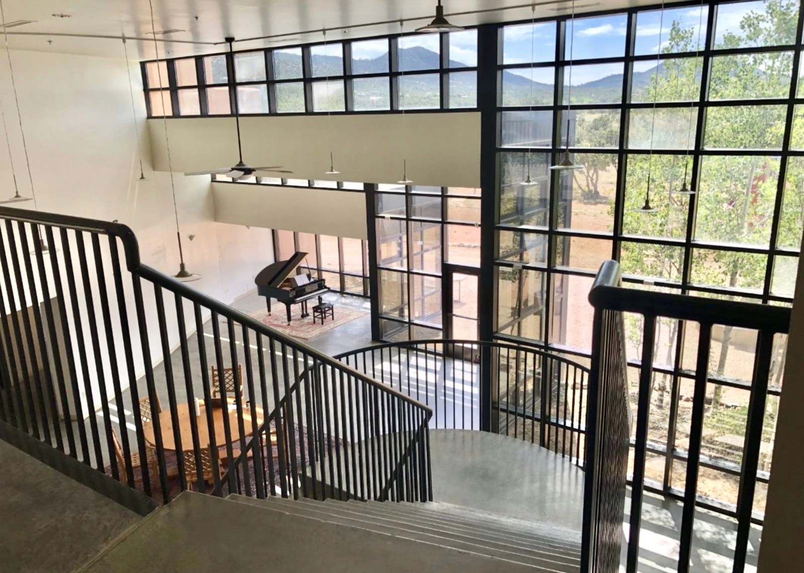 Multedo Campus interior atrium and stair with mountain views