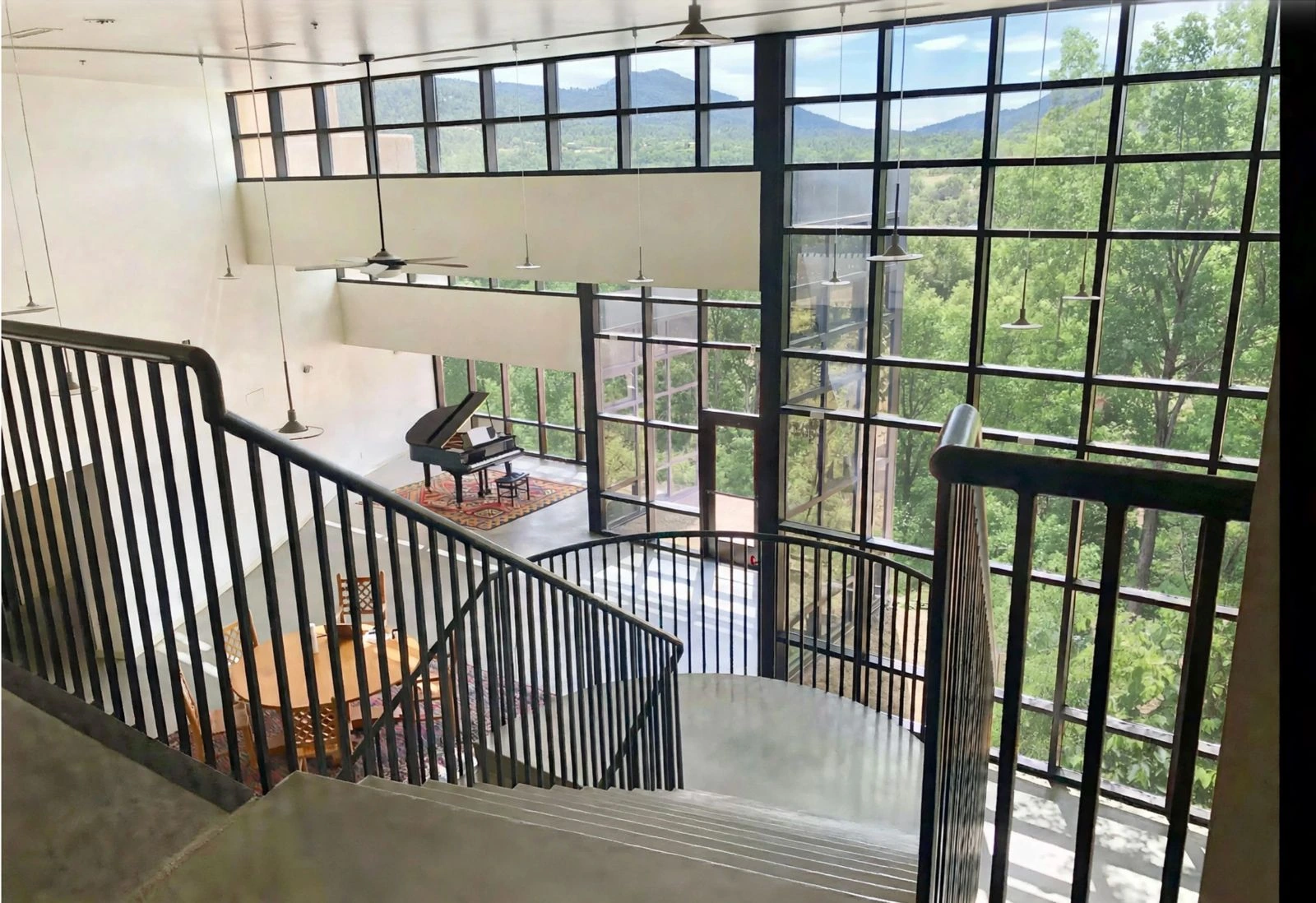 Multedo Campus interior atrium and stair with mountain views